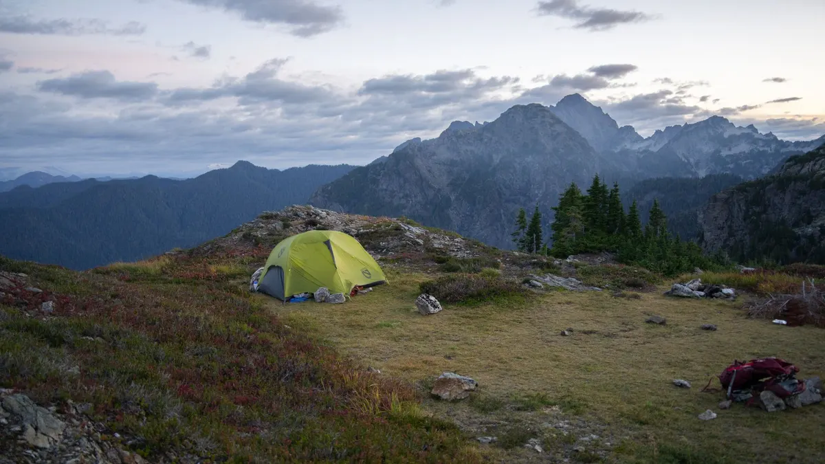 A flat clearing suitable for a campsite