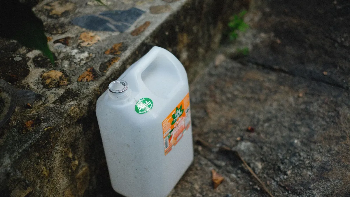 Water jugs beside a camper