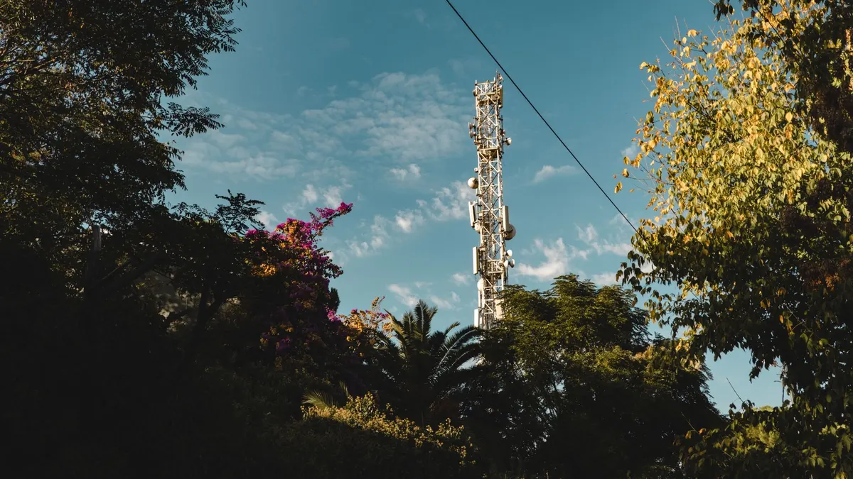 Distant cell tower on a ridge